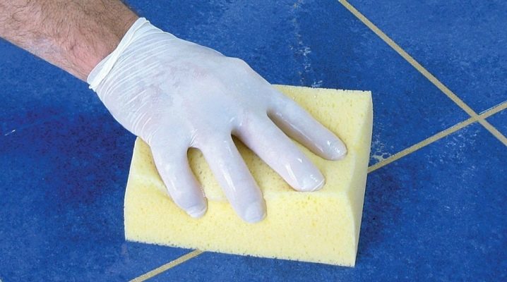  How can I scrub the grout from the tile?
